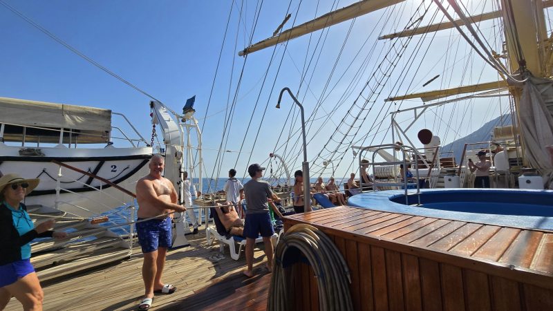 Paul putting up sail on royal clipper